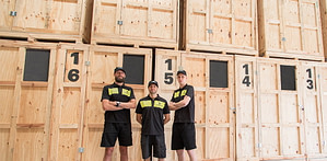 image showing melbourne removals and storage team infront of storage boxes